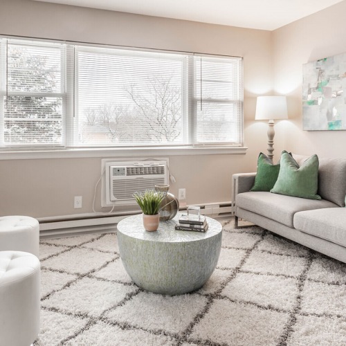 Living Room Spacious living room with wide windows creating lots of natural light